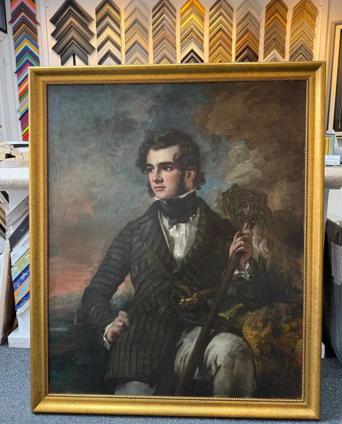 Real gold ornate frame with a classical portrait oil painting